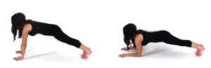 Christina Carlyle Doing an Elbow to Palms Plank a Deep Core Exercise