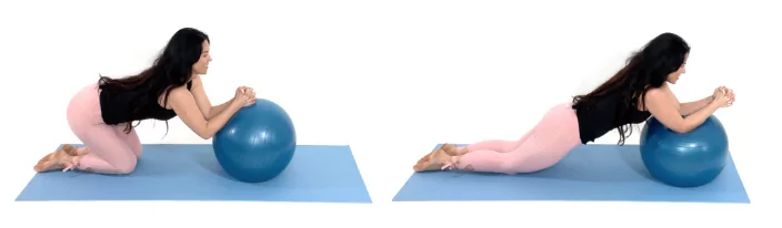 trainer Christina Carlyle doing a stability ball roll out exercise